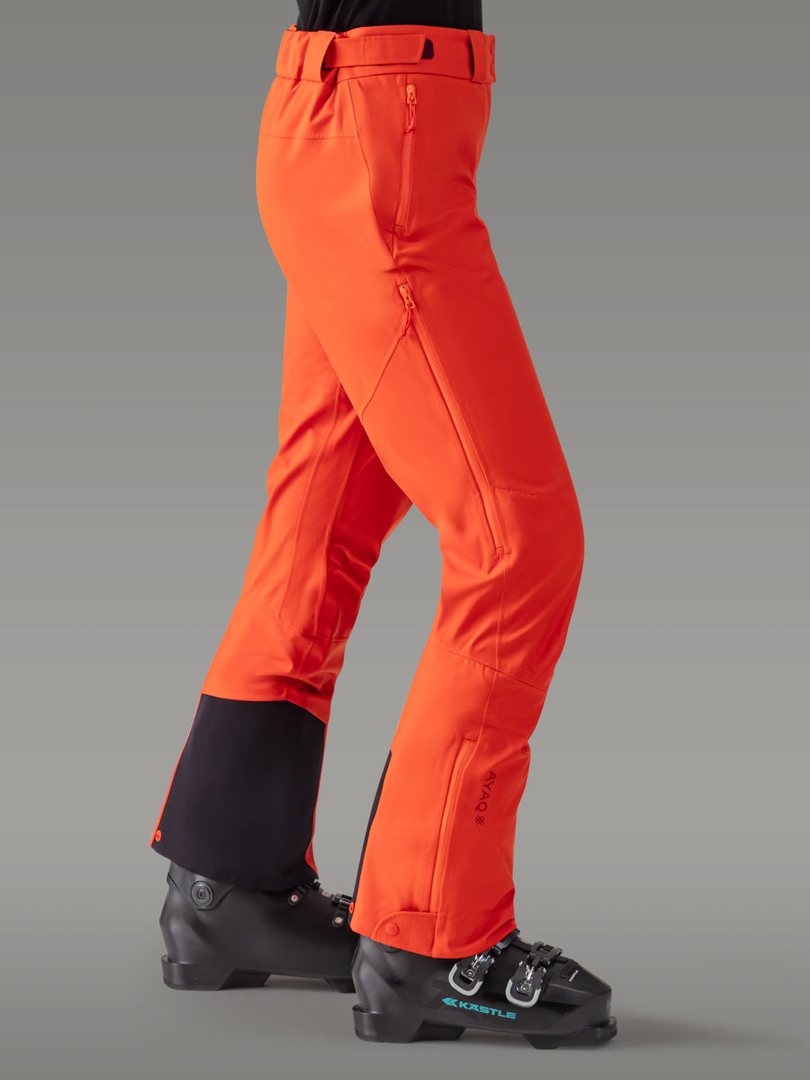NUNATAK Hardshell-bukse — Orange Sunrise